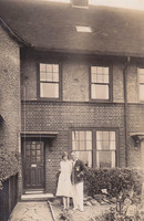 A Couple Outside Their House