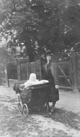 A Woman With A Baby In A Pram 1920s