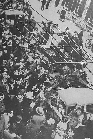 Belgian Soldiers And Civilians Greeting Lorryloads Of British Soldiers