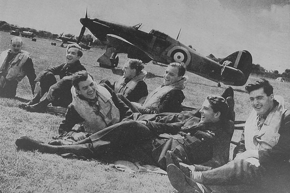 RAF Hurricane Pilots On The Airfield Waiting To Take Off