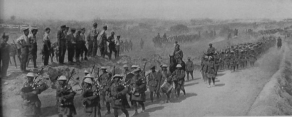 The Black Watch Marching Back From The Trenches Headed By Their Pipers