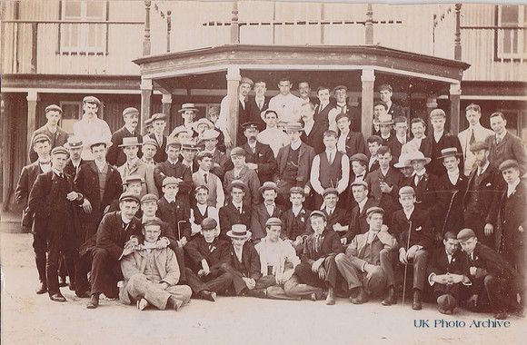 A  Group Of Men At A Club