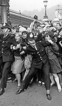 Police Struggling With Beatles Fans Outside Buckingham Palace 1965