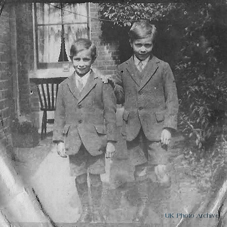 Two Boys In Their Back Garden