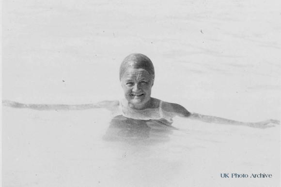 A Woman Swimming In A Bathing Cap c.1960s