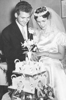 Cutting The Cake At A 1950s Wedding