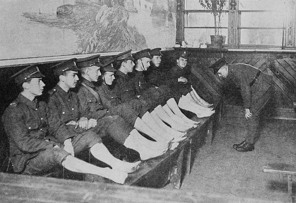 Recruits Having Their Feet Inspected After A Route March