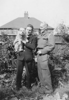 Norton John Roe (Left) With His Pet Dog