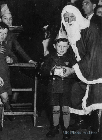 Terry Couzens With Father Christmas 1940s