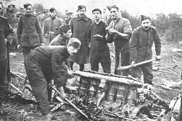 The Remains Of The Zeppelins Engine Being Examined