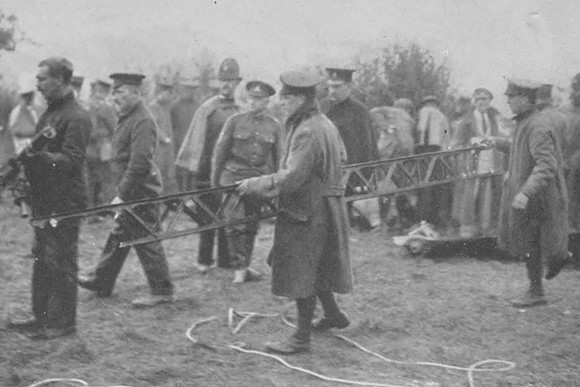 Soldiers Removing Part Of The Airships Framework