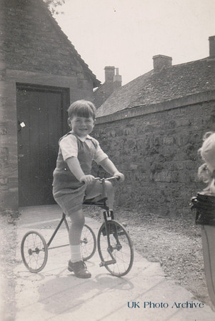 A Little Boy On A Tricycle 1930s