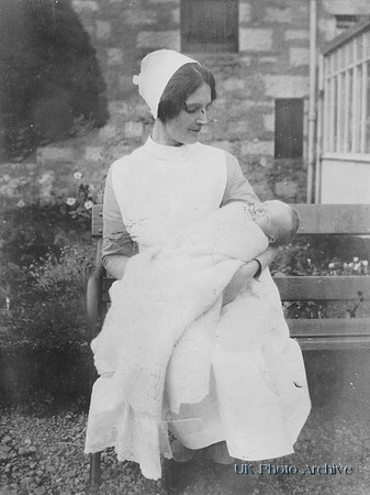 A Nurse With A Baby 1920s