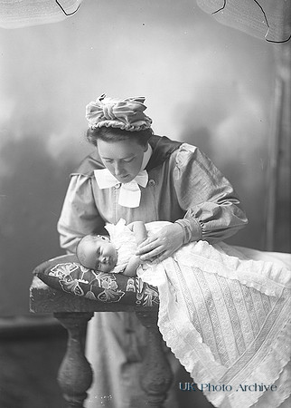 Nurse Mackintosh With A Baby
