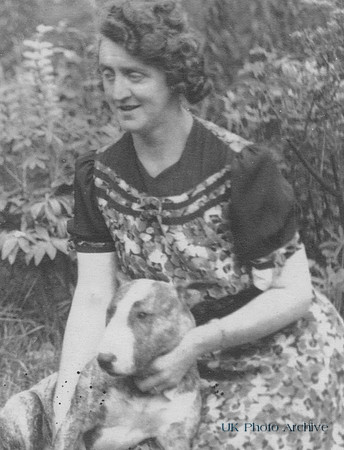 A Woman With Her English Bull Terrier