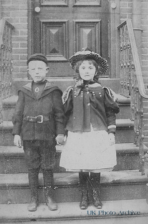 Victorian Children Outside Their House