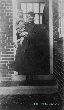 A Woman With A Little Boy 1920s