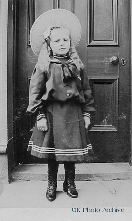 A Little Girl At Her Front Door c.1900
