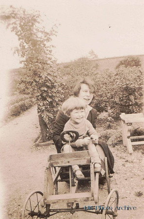 A Little Girl On A Go Kart In The 1930s
