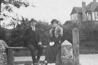 Man And Woman Sitting In Lane Wearing Fox Stole 1930s