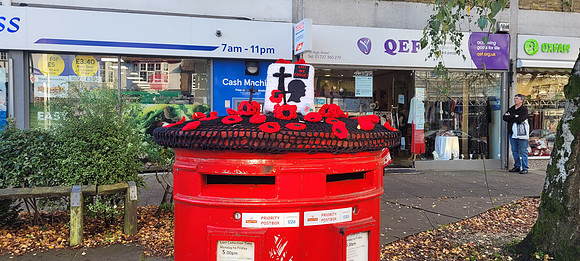 A Post Box Knitted Topper At Banstead Surrey